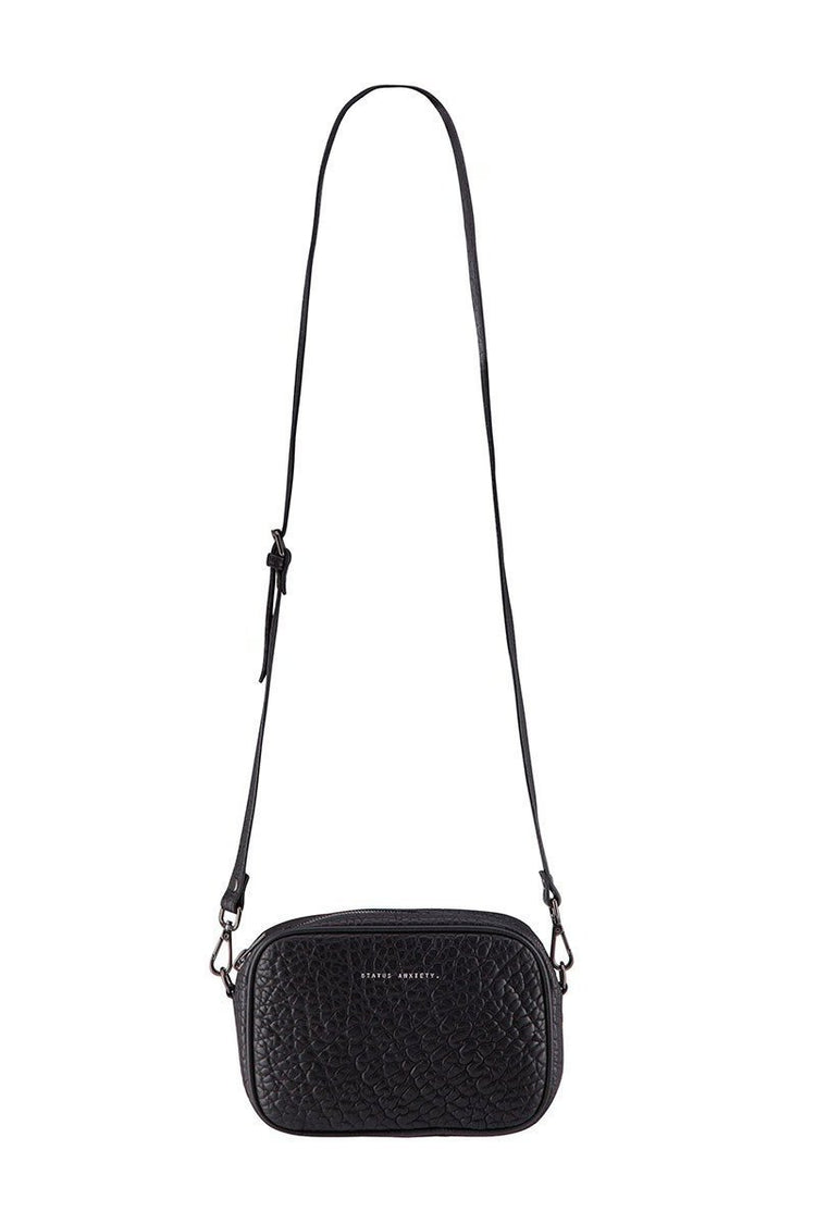 Status anxiety bags 2025 sale